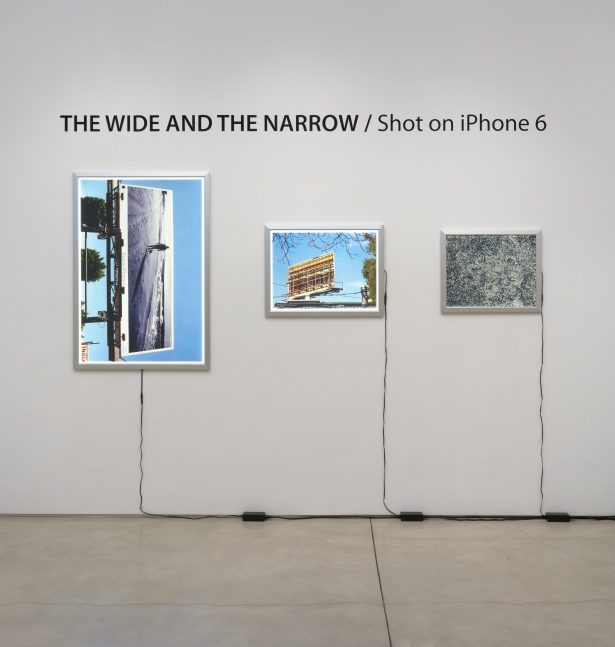 THE WIDE AND THE NARROW / Shot on iPhone 6 (#1), 2016, 3 LED Light Boxes with Duratrans Film, vinyl wall text